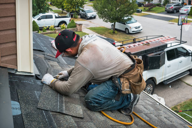 Professional Flat Roof Repair technician working in Casco, MI